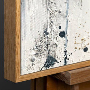 Abstraktes Leinwandbild mit Rahmen „Energie der Linien“ – monochrome Kunst mit Gold